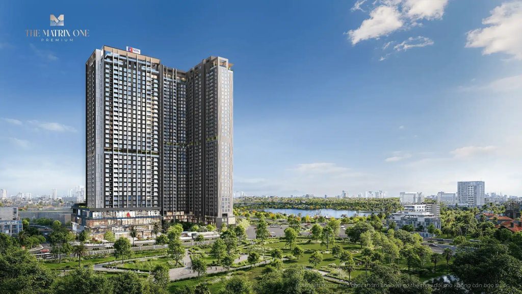 Vinhomes Nguyễn Trãi - Đô thị khép kín giữa lòng Hà Nội 2 Hình ảnh Vinhomes Nguyễn Trãi với hai tòa tháp cao tầng hiện đại, bao quanh bởi công viên xanh tươi, hồ nước yên bình và đường đi bộ, dưới bầu trời xanh với vài đám mây trắng, xa xa là khung cảnh thành phố Hà Nội.